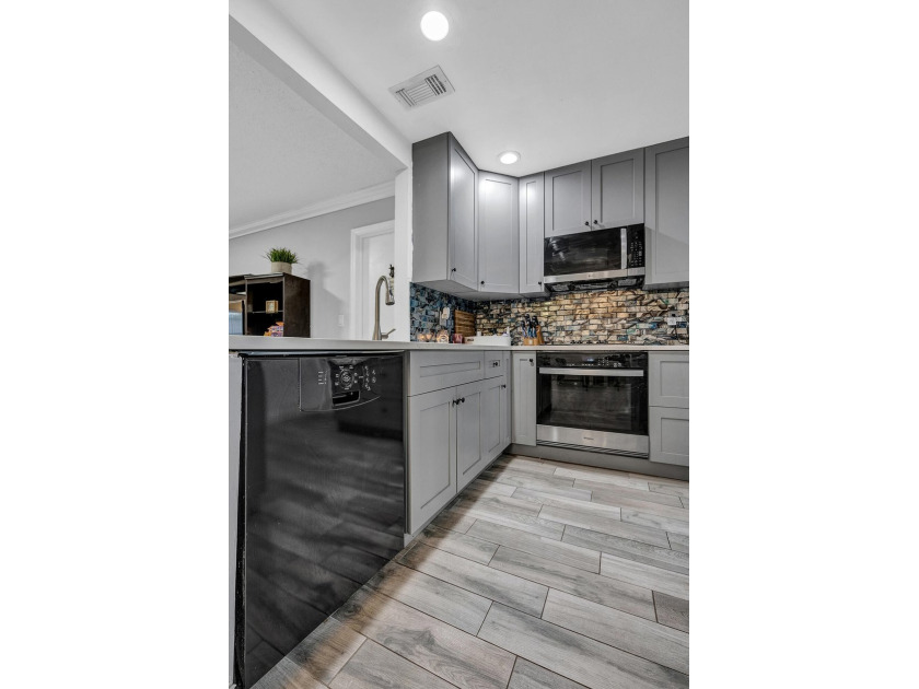 Welcome to this charming 3-bedroom, 2-bath single-family home in - photo 8