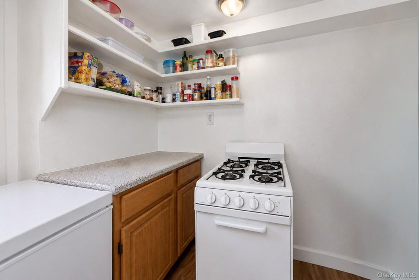 Solid brick home offering endless potential! Features include a - photo 17