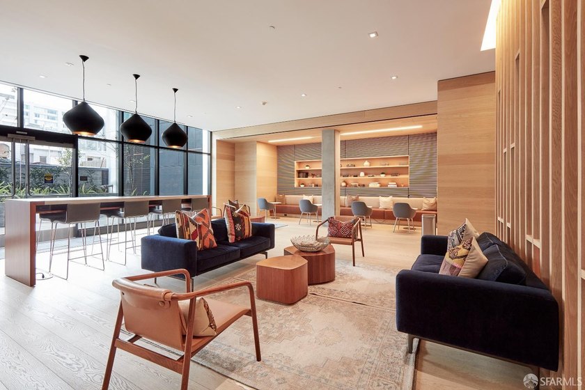 Situated on the 11th floor, this luminous two-bedroom, two-bath - photo 23