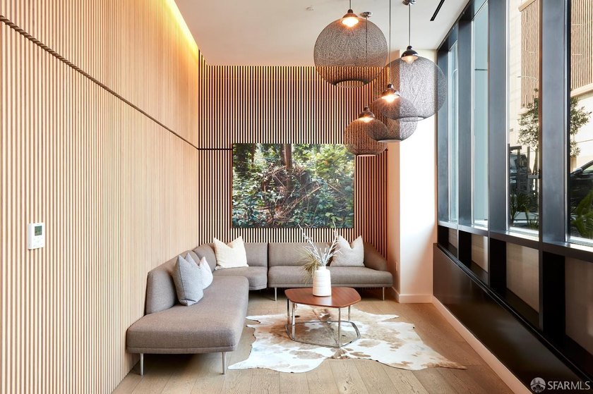 Situated on the 11th floor, this luminous two-bedroom, two-bath - photo 25