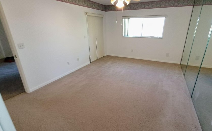 This spacious 2-bedroom, 2-bathroom penthouse condo offers - photo 6