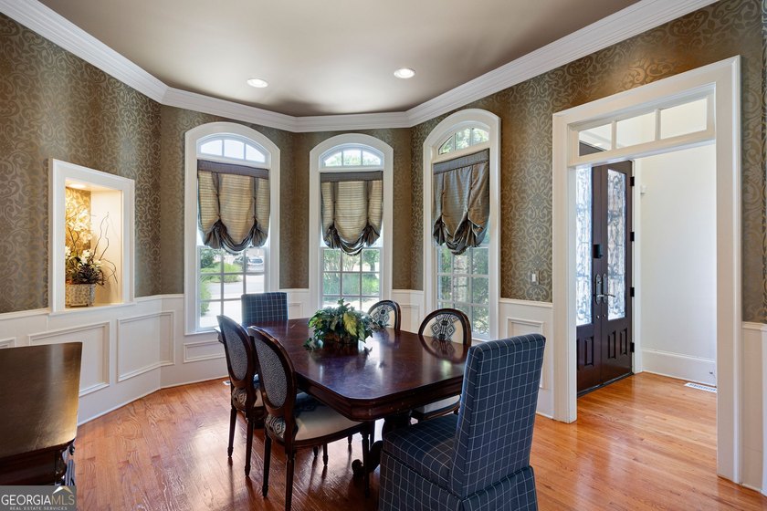 Nestled behind the gates of prestigious Haynes Manor, one of - photo 11