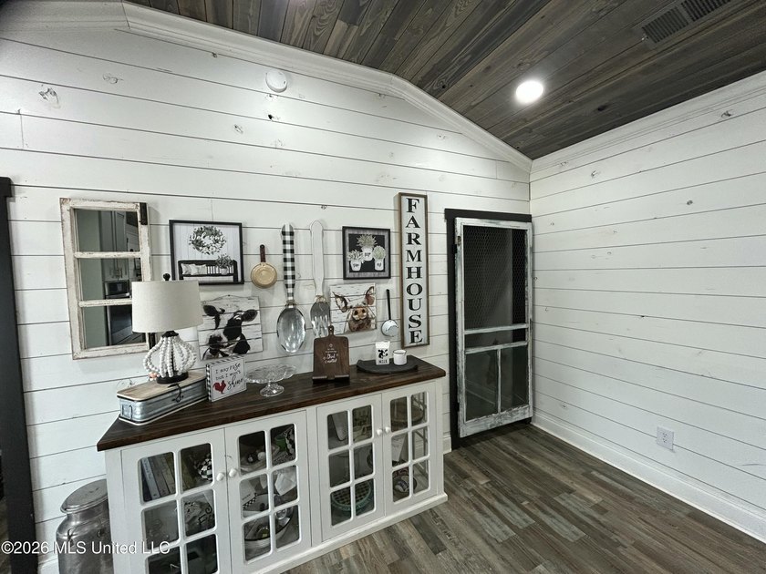 Welcome to this charming 3-bedroom, 2-bath farmhouse retreat - photo 11