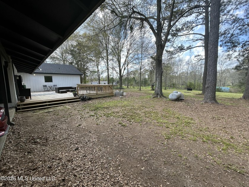 Welcome to this charming 3-bedroom, 2-bath farmhouse retreat - photo 31