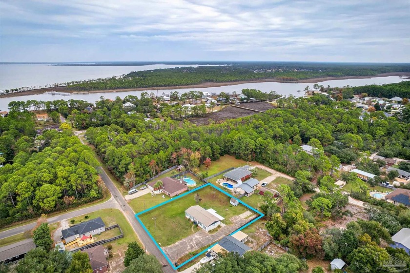 This stunning home, situated on three generous lots totaling 0 - photo 50