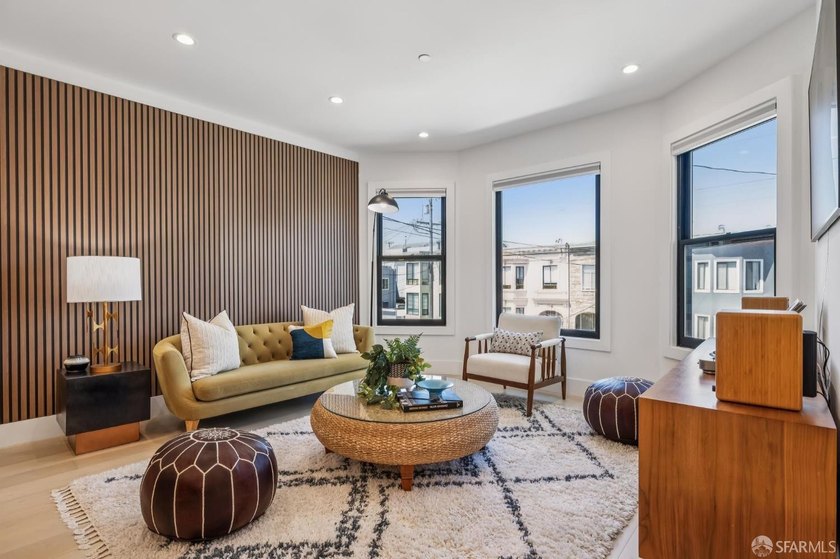 Thoughtfully renovated in 2023, this exceptional bi-level upper - photo 14