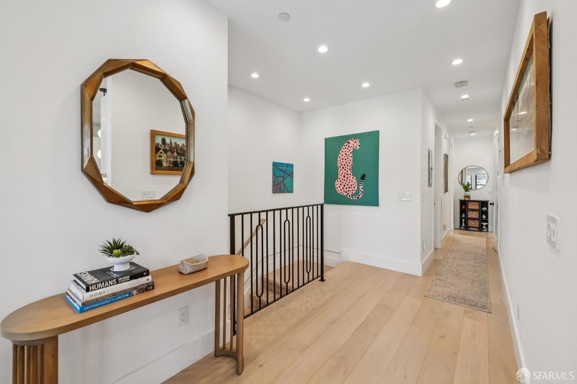 Thoughtfully renovated in 2023, this exceptional bi-level upper - photo 30