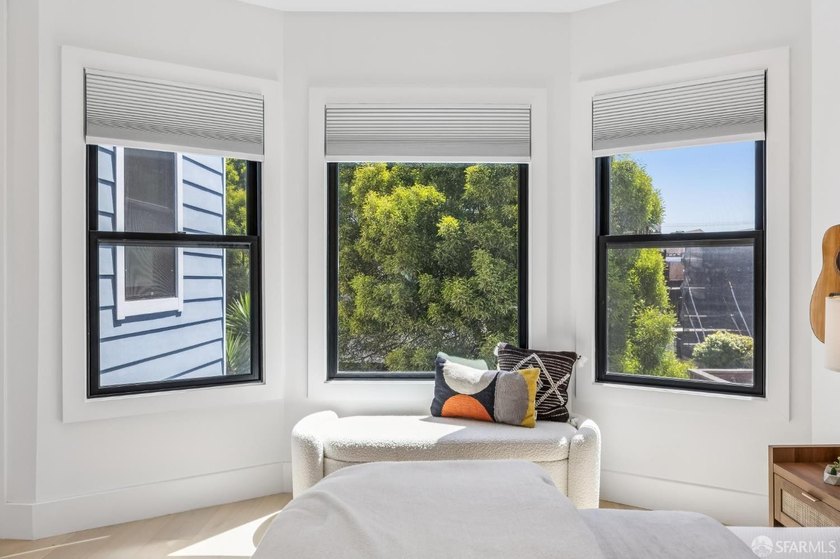 Thoughtfully renovated in 2023, this exceptional bi-level upper - photo 35