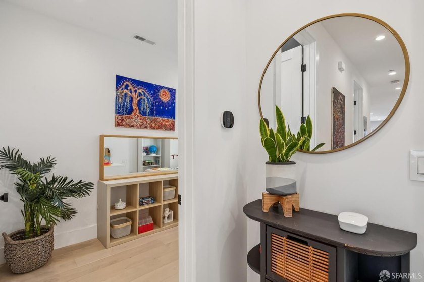 Thoughtfully renovated in 2023, this exceptional bi-level upper - photo 40