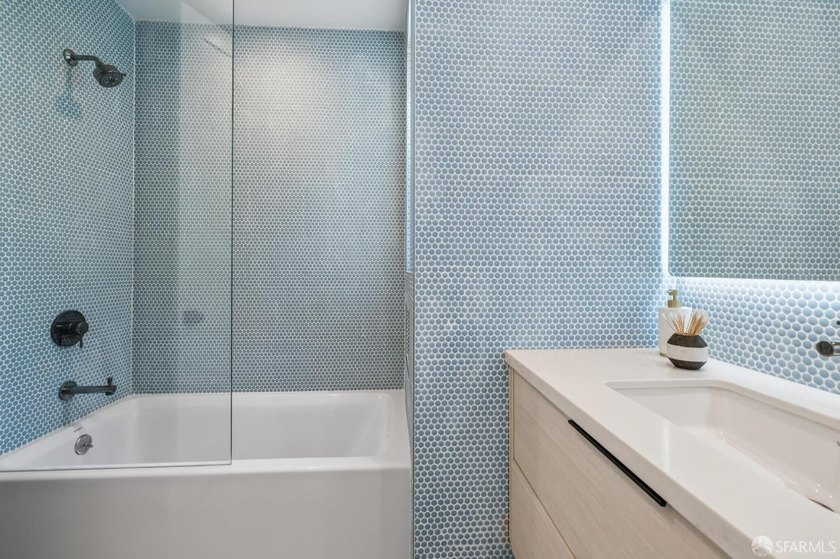 Thoughtfully renovated in 2023, this exceptional bi-level upper - photo 46