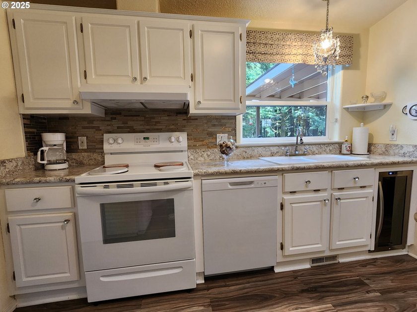 Beautifully remodeled home loaded with quality upgrades, tucked - photo 8