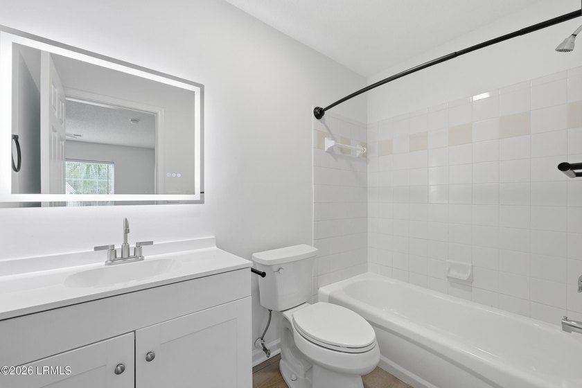 Welcome to The Estates at Westbury! Renovated in 2026, this - photo 17