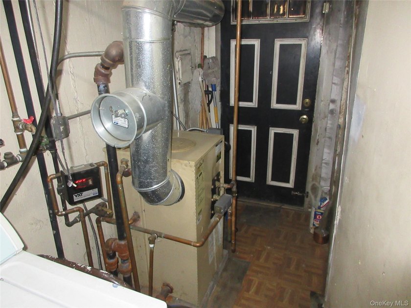Well-maintained attached brick single- family home located in - photo 13