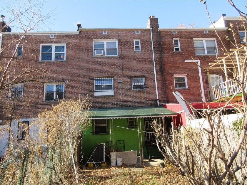 Well-maintained attached brick single- family home located in - photo 14