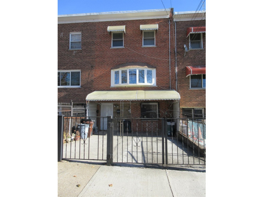 Well-maintained attached brick single- family home located in - photo 18