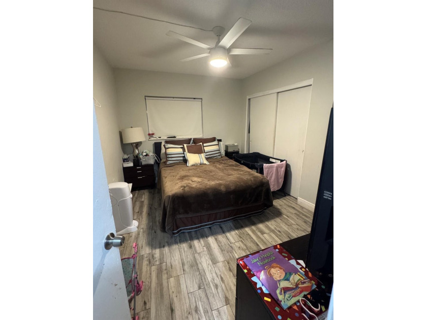 Welcome to this charming 3-bedroom, 2-bathroom condominium - photo 8