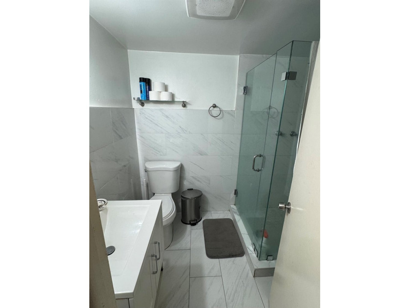 Welcome to this charming 3-bedroom, 2-bathroom condominium - photo 9