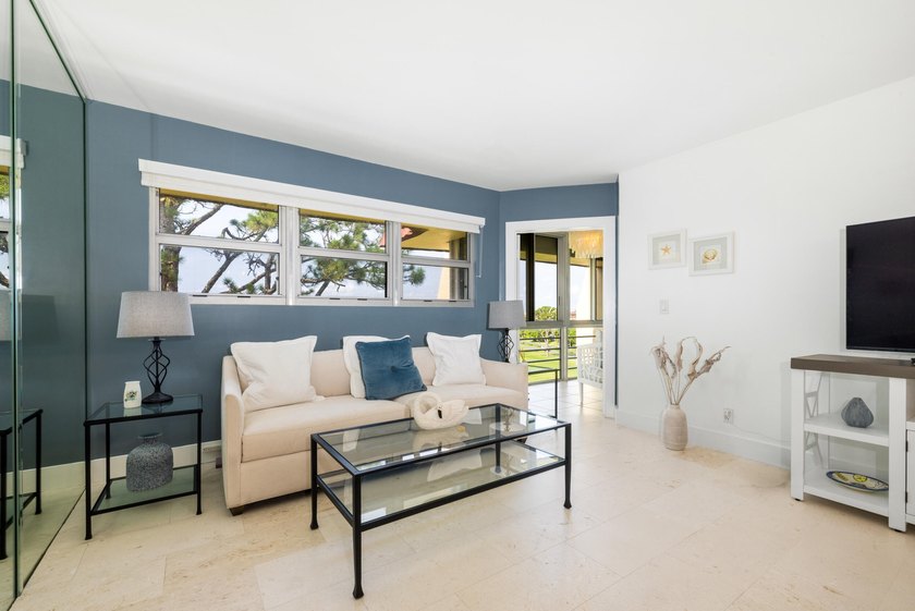 Welcome to the epitome of Florida condo living! This rare, fully - photo 6