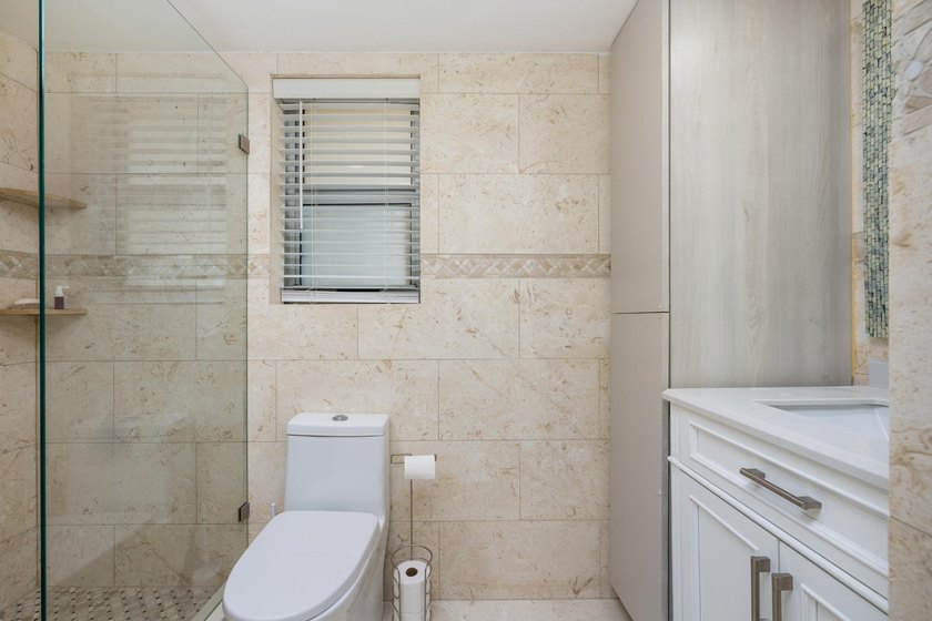 Welcome to the epitome of Florida condo living! This rare, fully - photo 9