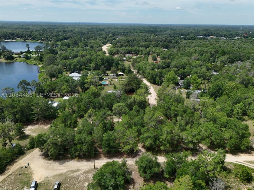 Discover the potential of this spacious vacant lot located in - photo 11