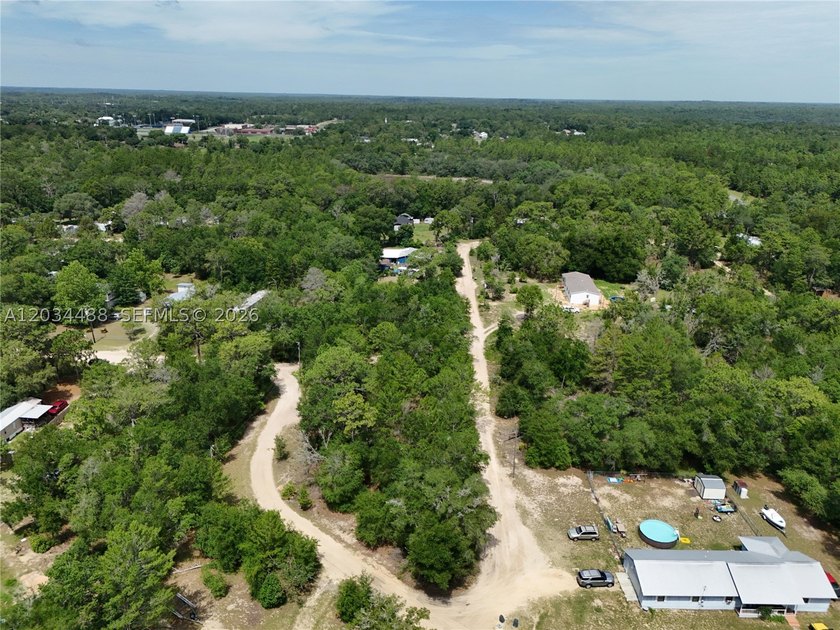 Discover the potential of this spacious vacant lot located in - photo 12