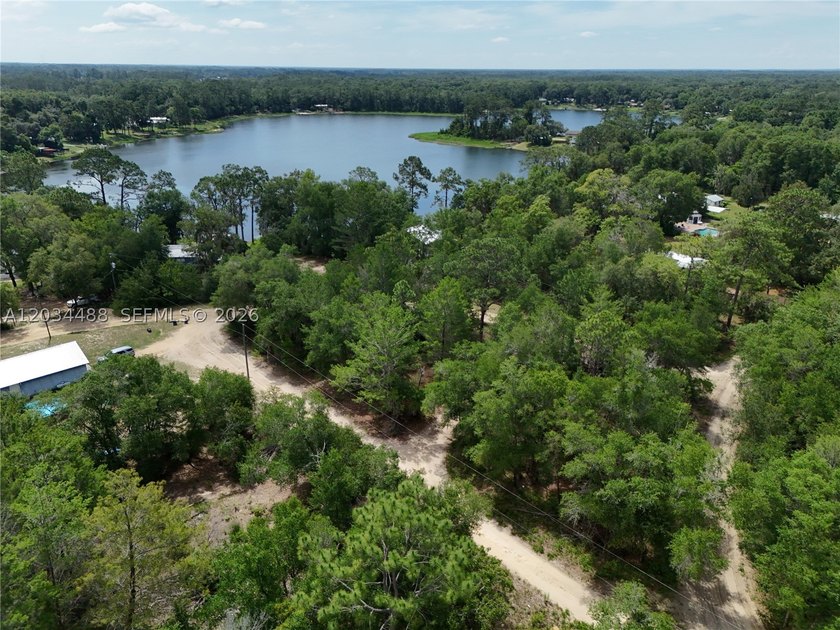 Discover the potential of this spacious vacant lot located in - photo 13