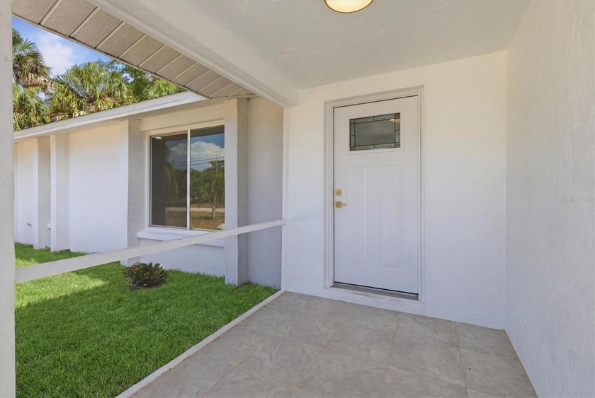 Experience modern Florida living in this completely remodeled - photo 3