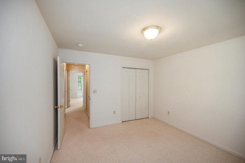 Nestled among mature green trees in the gated Lake of the Woods - photo 29