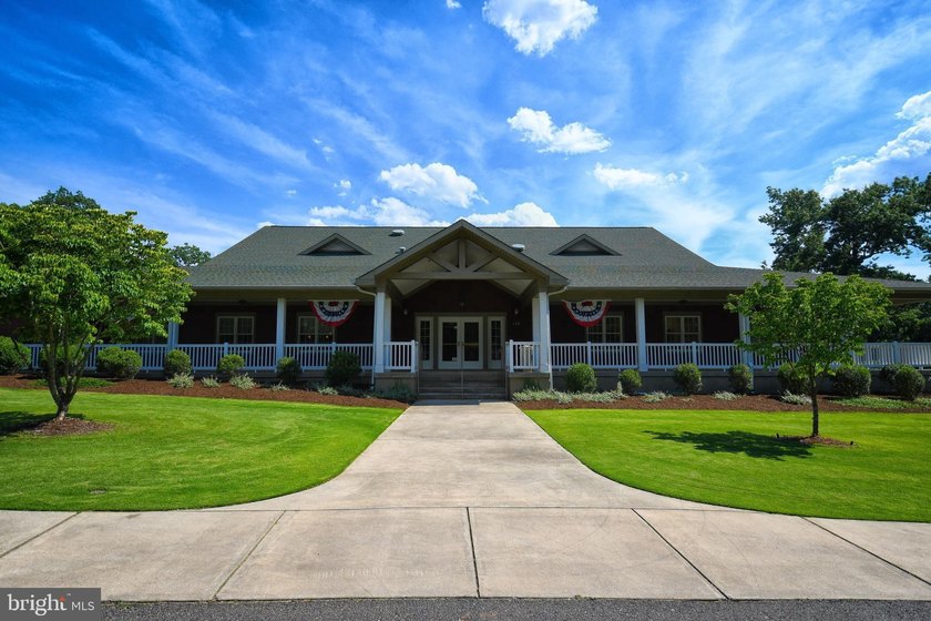 Nestled among mature green trees in the gated Lake of the Woods - photo 43
