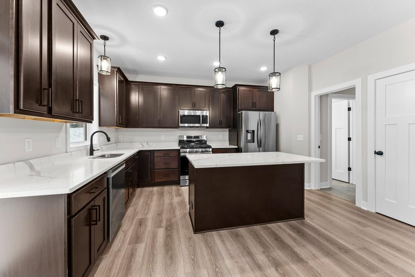 This stunning two-story new construction offers a perfect blend - photo 11