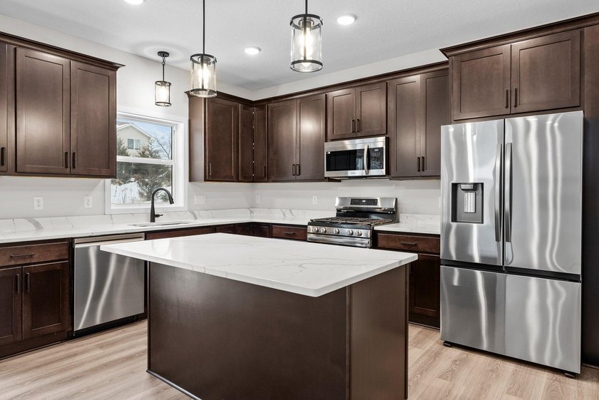 This stunning two-story new construction offers a perfect blend - photo 12