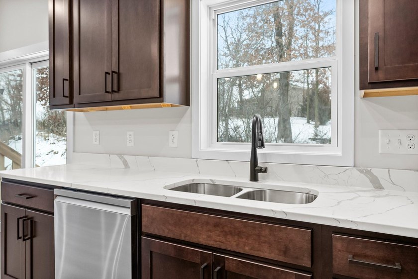 This stunning two-story new construction offers a perfect blend - photo 14