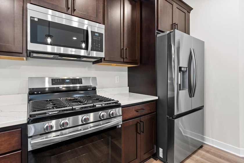 This stunning two-story new construction offers a perfect blend - photo 15
