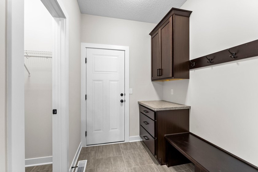 This stunning two-story new construction offers a perfect blend - photo 17