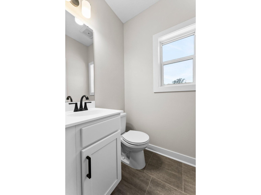 This stunning two-story new construction offers a perfect blend - photo 19