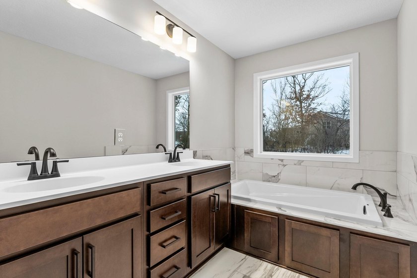 This stunning two-story new construction offers a perfect blend - photo 23