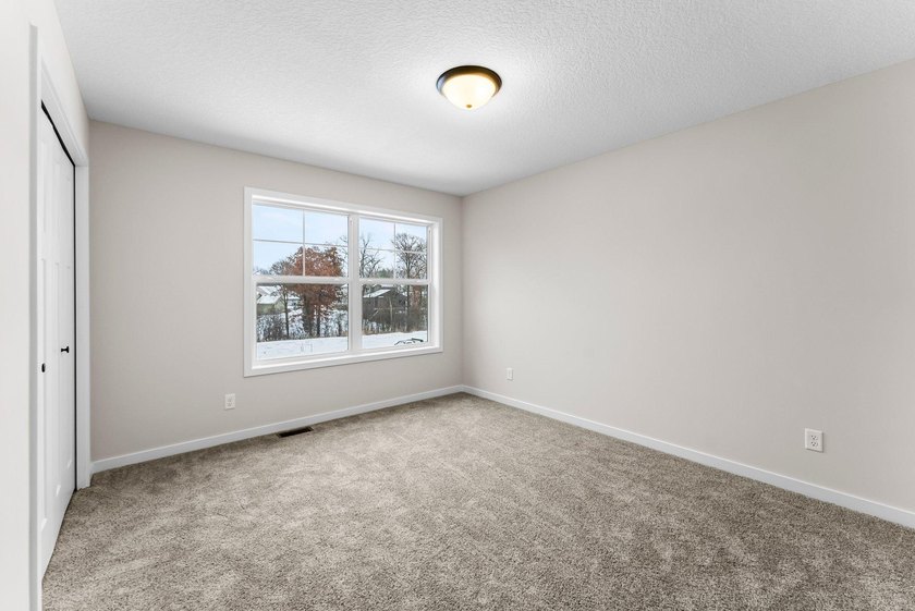 This stunning two-story new construction offers a perfect blend - photo 29