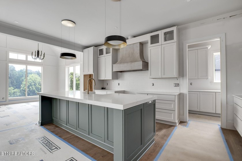 Nearly completed new construction on a premier lakefront - photo 7