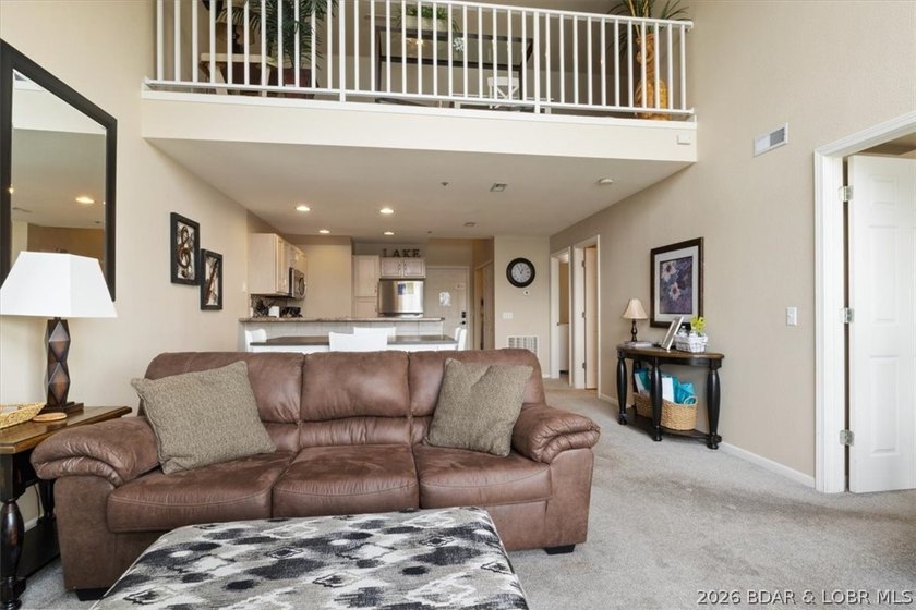 This beautifully updated condo sits high above the lake with - photo 12