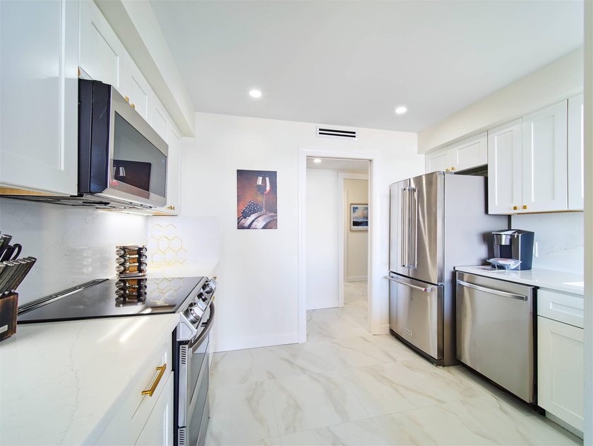 Sophisticated, elevated, and fully reimagined, this 2-bedroom - photo 14