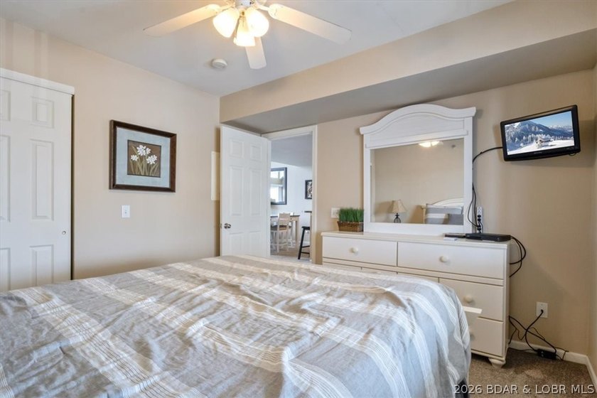 This beautifully updated condo sits high above the lake with - photo 15