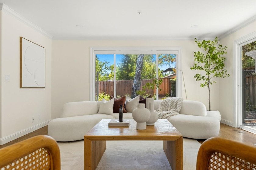 Situated on a picturesque tree-lined street and located down a - photo 15