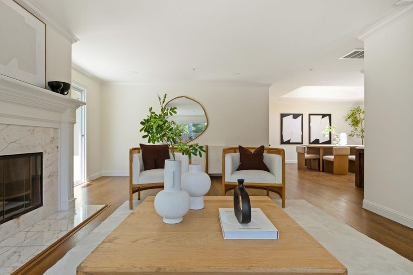 Situated on a picturesque tree-lined street and located down a - photo 16