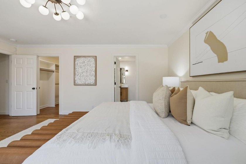 Situated on a picturesque tree-lined street and located down a - photo 18
