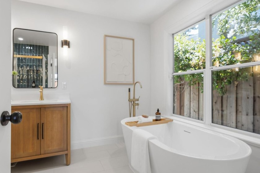 Situated on a picturesque tree-lined street and located down a - photo 19