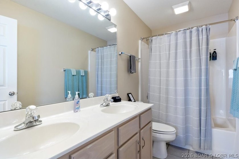 This beautifully updated condo sits high above the lake with - photo 21
