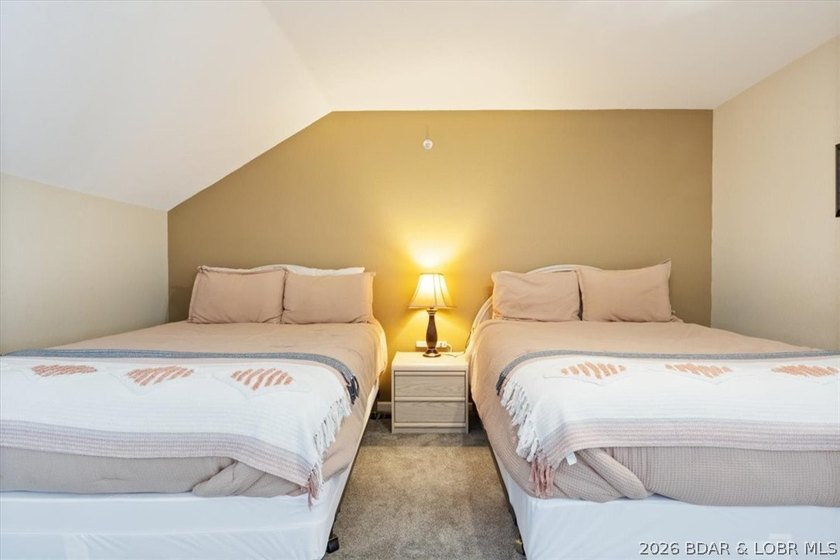 This beautifully updated condo sits high above the lake with - photo 26