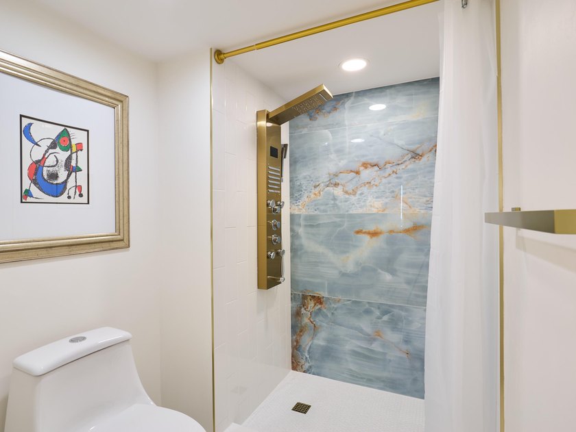Sophisticated, elevated, and fully reimagined, this 2-bedroom - photo 26