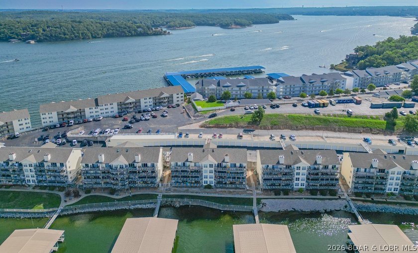 This beautifully updated condo sits high above the lake with - photo 30