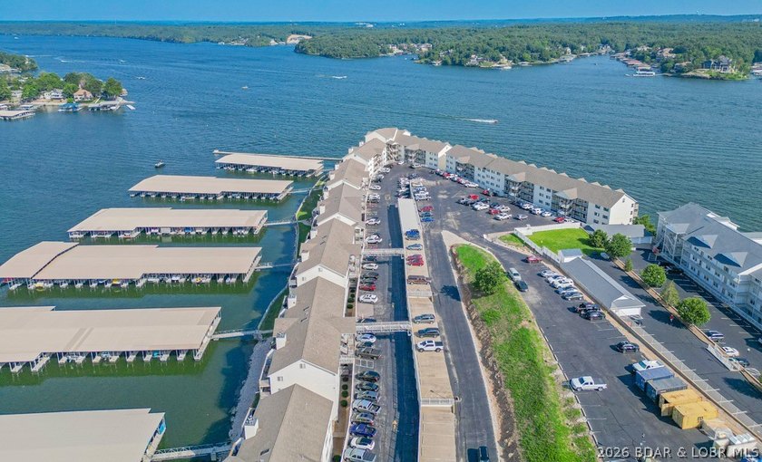 This beautifully updated condo sits high above the lake with - photo 32